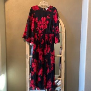 H & M black and red dress with pleated skirt and sleeves.